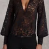 Serenya Sheer Lace Plunge-Neck Loose-Fit Playsuit in Black Serenya Sheer Lace Plunge-Neck Loose-Fit Playsuit in Black