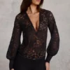 Serenya Sheer Lace Plunge-Neck Loose-Fit Playsuit in Black Serenya Sheer Lace Plunge-Neck Loose-Fit Playsuit in Black