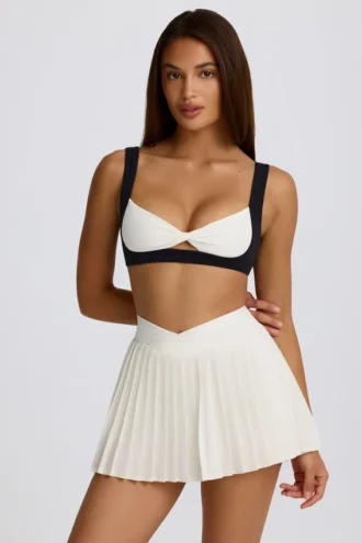 Soft Active Crossover Pleated Mini Skort in Ivory Soft Active Crossover Pleated Mini Skort in Ivory