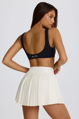 Soft Active Crossover Pleated Mini Skort in Ivory Soft Active Crossover Pleated Mini Skort in Ivory