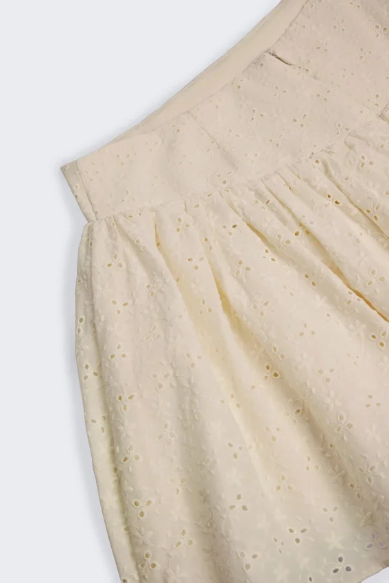 Thia Bow-Detail Broderie Anglaise Mini Skirt in Ivory Thia Bow-Detail Broderie Anglaise Mini Skirt in Ivory