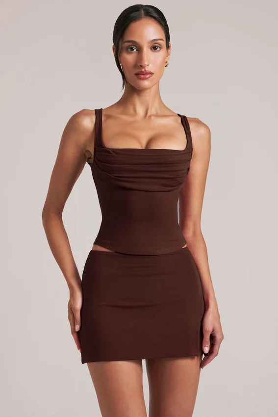 Tula Mid-Rise Bodycon Ultra Mini Skirt with Split in Chocolate Brown Tula Mid-Rise Bodycon Ultra Mini Skirt with Split in Chocolate Brown