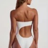 Tulum Bead-Embellished Cut-Out Bandeau Swimsuit in Ivory Tulum Bead-Embellished Cut-Out Bandeau Swimsuit in Ivory