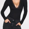 Verity Ribbed Modal Long-Sleeve Plunge Bodysuit in Black Verity Ribbed Modal Long-Sleeve Plunge Bodysuit in Black
