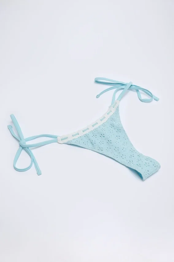 Vernazza Broderie Anglaise Side-Tie Thong Bikini Bottoms in Powder Blue Vernazza Broderie Anglaise Side-Tie Thong Bikini Bottoms in Powder Blue