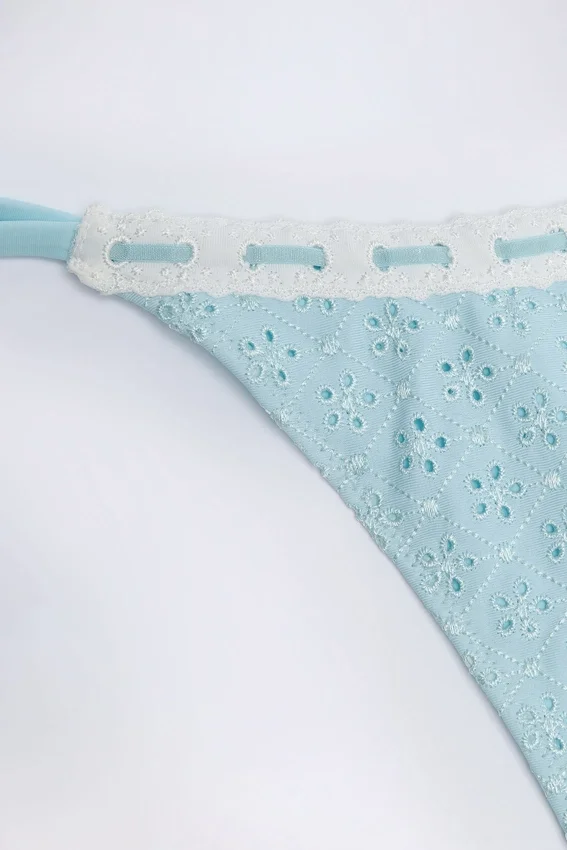 Vernazza Broderie Anglaise Side-Tie Thong Bikini Bottoms in Powder Blue Vernazza Broderie Anglaise Side-Tie Thong Bikini Bottoms in Powder Blue