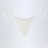 Vernazza Broderie Anglaise Side-Tie Thong Bikini Bottoms in White Vernazza Broderie Anglaise Side-Tie Thong Bikini Bottoms in White