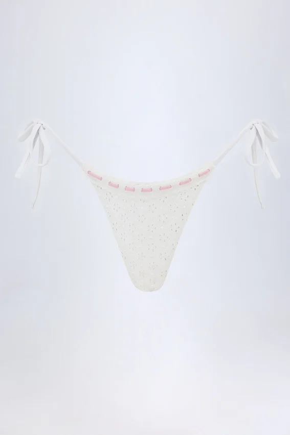 Vernazza Broderie Anglaise Side-Tie Thong Bikini Bottoms in White Vernazza Broderie Anglaise Side-Tie Thong Bikini Bottoms in White
