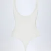 Zayla Sheer Lace Scalloped Plunge-Neck Bodysuit in White Zayla Sheer Lace Scalloped Plunge-Neck Bodysuit in White