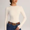 Ziva Modal Round-Neck Long-Sleeve Bodysuit in Cream Ziva Modal Round-Neck Long-Sleeve Bodysuit in Cream