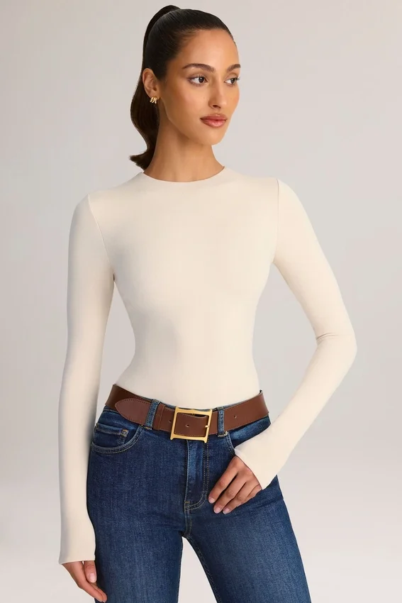 Ziva Modal Round-Neck Long-Sleeve Bodysuit in Cream Ziva Modal Round-Neck Long-Sleeve Bodysuit in Cream