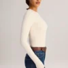 Ziva Modal Round-Neck Long-Sleeve Bodysuit in Cream Ziva Modal Round-Neck Long-Sleeve Bodysuit in Cream