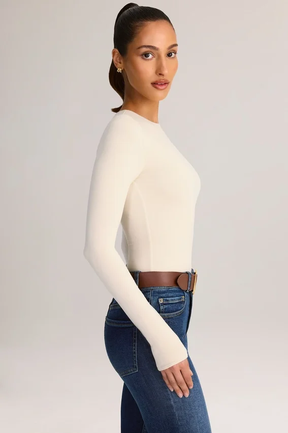 Ziva Modal Round-Neck Long-Sleeve Bodysuit in Cream Ziva Modal Round-Neck Long-Sleeve Bodysuit in Cream