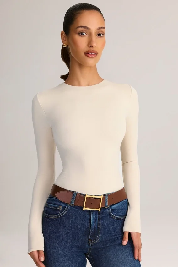 Ziva Modal Round-Neck Long-Sleeve Bodysuit in Cream Ziva Modal Round-Neck Long-Sleeve Bodysuit in Cream