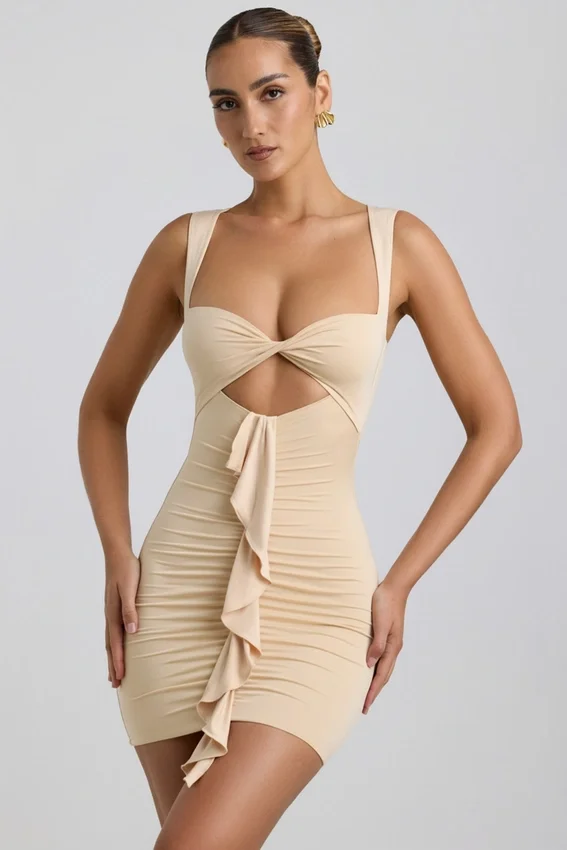 Zivanka Slinky Jersey Cut-Out Ruffle-Trim Mini Dress in Buttercream Zivanka Slinky Jersey Cut-Out Ruffle-Trim Mini Dress in Buttercream