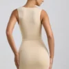 Zivanka Slinky Jersey Cut-Out Ruffle-Trim Mini Dress in Buttercream Zivanka Slinky Jersey Cut-Out Ruffle-Trim Mini Dress in Buttercream