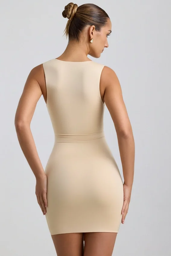 Zivanka Slinky Jersey Cut-Out Ruffle-Trim Mini Dress in Buttercream Zivanka Slinky Jersey Cut-Out Ruffle-Trim Mini Dress in Buttercream