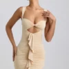 Zivanka Slinky Jersey Cut-Out Ruffle-Trim Mini Dress in Buttercream Zivanka Slinky Jersey Cut-Out Ruffle-Trim Mini Dress in Buttercream