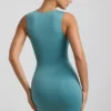 Zivanka Slinky Jersey Cut-Out Ruffle-Trim Mini Dress in Sea Green Zivanka Slinky Jersey Cut-Out Ruffle-Trim Mini Dress in Sea Green