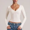 Zyra V-Neck Long-Sleeve Top in Ivory Zyra V-Neck Long-Sleeve Top in Ivory
