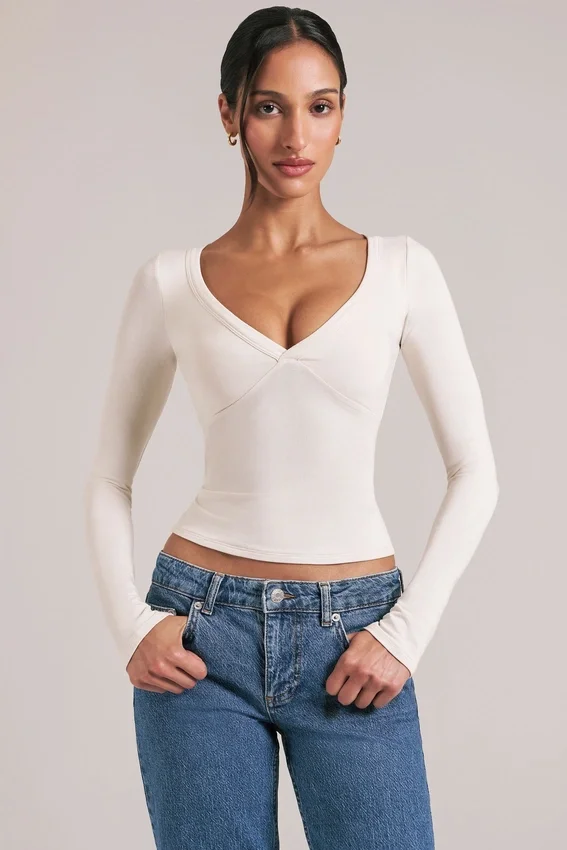 Zyra V-Neck Long-Sleeve Top in Ivory Zyra V-Neck Long-Sleeve Top in Ivory