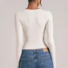 Zyra V-Neck Long-Sleeve Top in Ivory Zyra V-Neck Long-Sleeve Top in Ivory