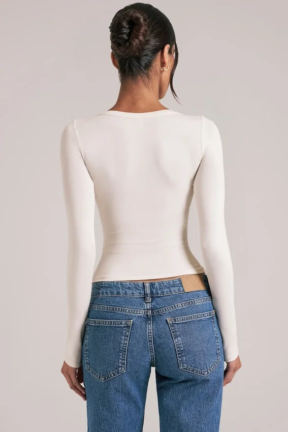 Zyra V-Neck Long-Sleeve Top in Ivory Zyra V-Neck Long-Sleeve Top in Ivory