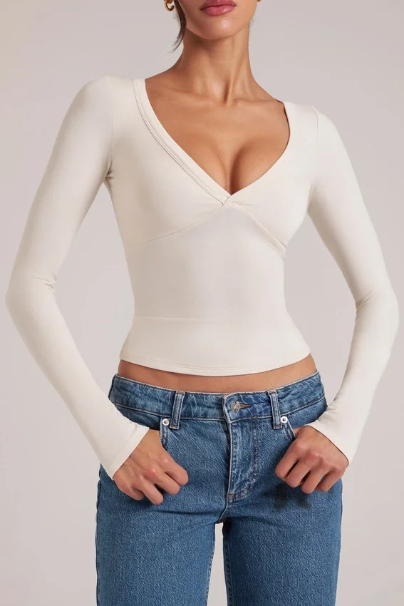 Zyra V-Neck Long-Sleeve Top in Ivory Zyra V-Neck Long-Sleeve Top in Ivory
