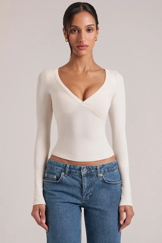 Zyra V-Neck Long-Sleeve Top in Ivory Zyra V-Neck Long-Sleeve Top in Ivory