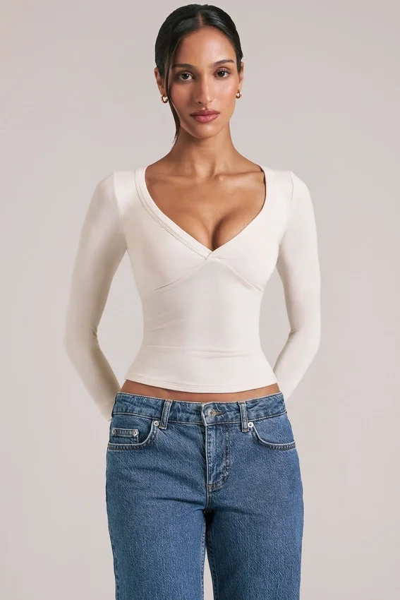 Zyra V-Neck Long-Sleeve Top in Ivory Zyra V-Neck Long-Sleeve Top in Ivory