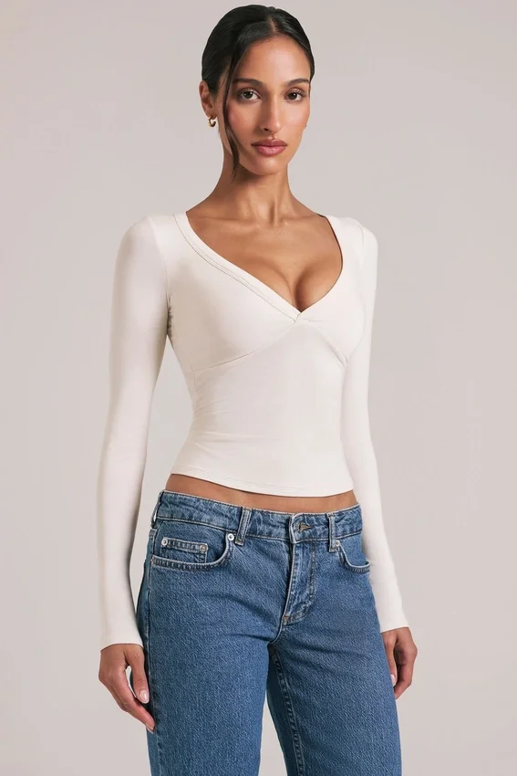 Zyra V-Neck Long-Sleeve Top in Ivory Zyra V-Neck Long-Sleeve Top in Ivory